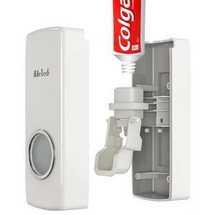 TOOTHPASTE DISPENSER WITH TOOTHBRUSH HOLDER